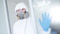 Medical worker wearing biohazard protective suit Royalty Free Stock Photo