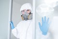 Medical worker wearing biohazard protective suit Royalty Free Stock Photo