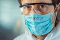 Medical worker wearing Coronavirus face protective mask Royalty Free Stock Photo