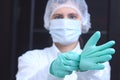 Medical worker wearing gloves