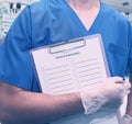 Medical worker whith clipboard in hospital Royalty Free Stock Photo