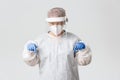 Medical workers, covid-19 pandemic, coronavirus concept. Impressed and curious female doctor, physician in personal Royalty Free Stock Photo