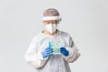 Medical workers, covid-19 pandemic, coronavirus concept. Portrait of lab tech, scientist or doctor in personal