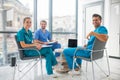 Medical workers having a changeover and looking positive Royalty Free Stock Photo