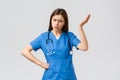 Medical workers, healthcare, covid-19 and vaccination concept. Frustrated and confused young female nurse, pretty doctor