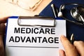 Medicare advantage in a clipboard. Royalty Free Stock Photo