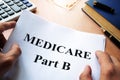 Medicare Part B on a desk. Royalty Free Stock Photo