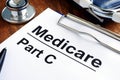 Medicare Part C papers and stethoscope