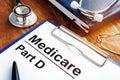 Medicare Part D documents with clipboard