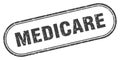 Medicare stamp. rounded grunge textured sign. Label