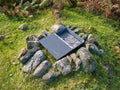 A medicated grit dispenser for red grouse on moorland in the Yorkshire Dales, Yorkshire, England, UK