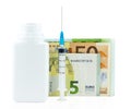 Medication bottle ,syringe and euro money