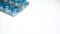 Blue tablets on a light background Royalty Free Stock Photo