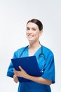 Glad female physician noting patients review of system