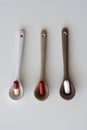 medication pills inside ceramic spoons. drugs, antibiotics, analgesics, narcotics