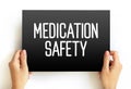 Medication Safety text on card, health concept background