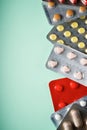 Medication tablets packed in blister packs on a table