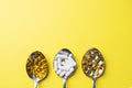 Medications vitamins tablets and pills in spoon. Yellow background. Copy of the space Royalty Free Stock Photo