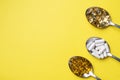 Medications vitamins tablets and pills in spoon. Yellow background. Copy of the space Royalty Free Stock Photo