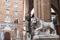 Medici Lion and Perseus statues and Palazzo Royalty Free Stock Photo