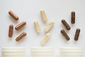 Medicinal capsule spill out of a three plastic bottles Royalty Free Stock Photo