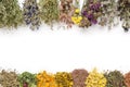 Medicinal plants bunches and piles of medicinal herbs on white background. Top view. Alternative medicine. Copy space Royalty Free Stock Photo