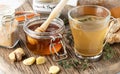 Medicinal tea with thyme, ginger and honey, ready for drinking. Royalty Free Stock Photo