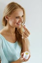 Medicine. Beautiful Girl Taking Medication, Vitamins, Pills. Royalty Free Stock Photo