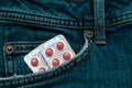 Pills in the Jeans Pocket. Close-Up Of Medicines In Pocket Of Jeans Royalty Free Stock Photo