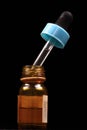 Medicine bottle and dropper Royalty Free Stock Photo