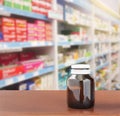 Medicine bottle on table Royalty Free Stock Photo