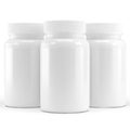 Medicine bottles without labels on white background