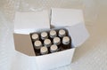 Medicine bottles in white paper box and air bubble Royalty Free Stock Photo