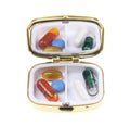 Medicine box with various tablets and vitamins on isolated white