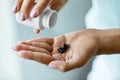 Medicine. Closeup Of Female Hand Pouring Pills Into Palm Royalty Free Stock Photo