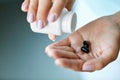 Medicine. Closeup Of Female Hand Pouring Pills Into Palm Royalty Free Stock Photo