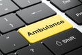 Medicine concept: Ambulance on computer keyboard background