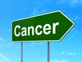 Medicine concept: Cancer on road sign background