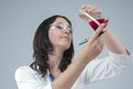 Medicine Concepts and Ideas. Female Laboratory Staff Working with Flasks and Liquids in Lab