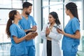 Medicine cure diseases but only doctors can cure patients. a group of medical practitioners having a discussion in a Royalty Free Stock Photo