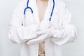 Medicine doctor close up in white coat wear gloves