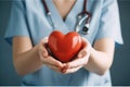 Medicine doctor holding red heart shape in hand, Medical heart cardiology concept Royalty Free Stock Photo
