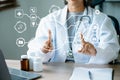 Medicine doctor using digital tablet and smartphone diagnose virtual electronic medical record on interface.Digital healthcare and Royalty Free Stock Photo