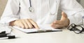 Medicine doctors working on desk. Royalty Free Stock Photo