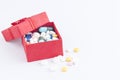 Medicine in a gift box on white background