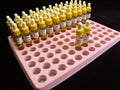 Medicine in glass vials arranged in a tray Royalty Free Stock Photo