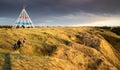 family walks outdoors along a hiking trail in Seven Persons Coulee