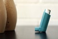 Medicine and health concept: Blue inhaler Royalty Free Stock Photo