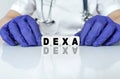 The doctor put together a word from cubes DEXA Royalty Free Stock Photo