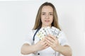 Medicine and health concept. Doctor woman holds pills in hands Royalty Free Stock Photo